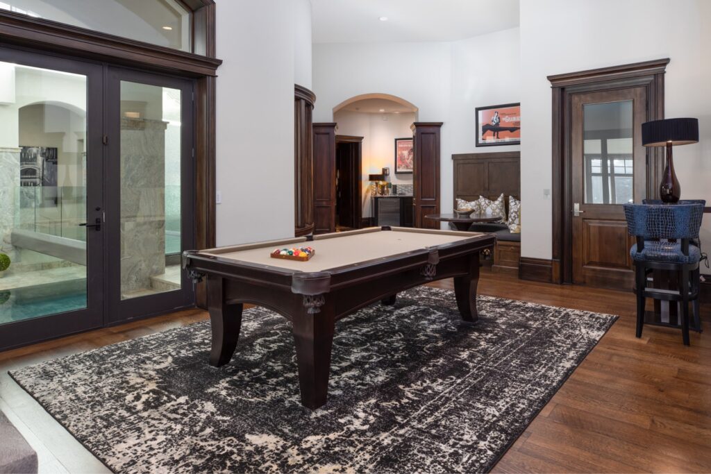 colony-white-pine-mountain-transitional-home-pool-table
